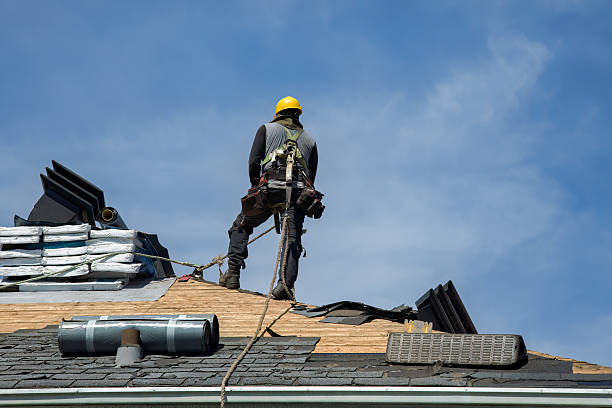 Professional Roof Replacement technician working in North Ferrisburgh, VT